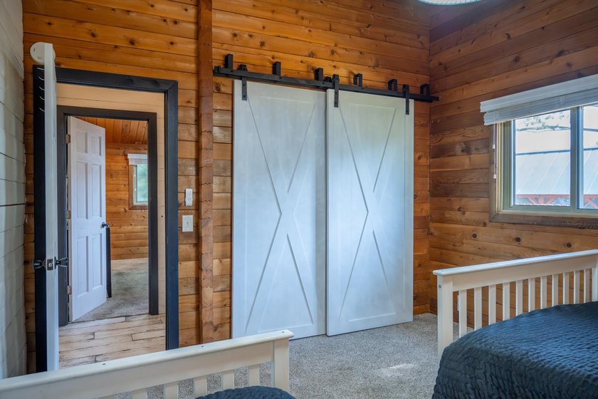 Enjoy 100 feet of owned frontage on Castle Rock Lake with this - photo 23