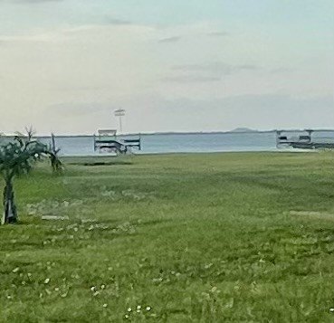 Waterview lot located in Sunset Bay subdivision. This one-acre - photo 8