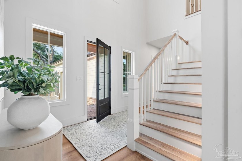 Located on Pensacola Bay, this fabulous residence features three - photo 9