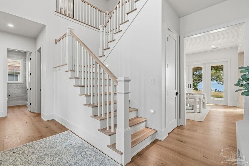 Located on Pensacola Bay, this fabulous residence features three - photo 10