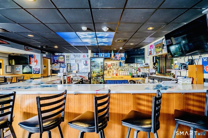 An exceptional opportunity to own both a successful, established - photo 11