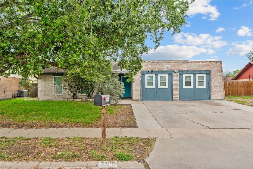 Welcome home to this beautifully remodeled 5-bedroom, 2 full - photo 2