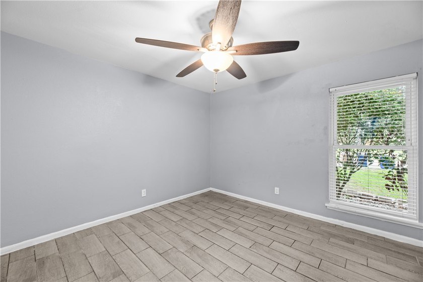 Welcome home to this beautifully remodeled 5-bedroom, 2 full - photo 9