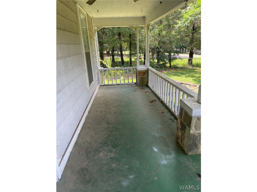 Discover this rare historical design home that needs TLC - photo 2