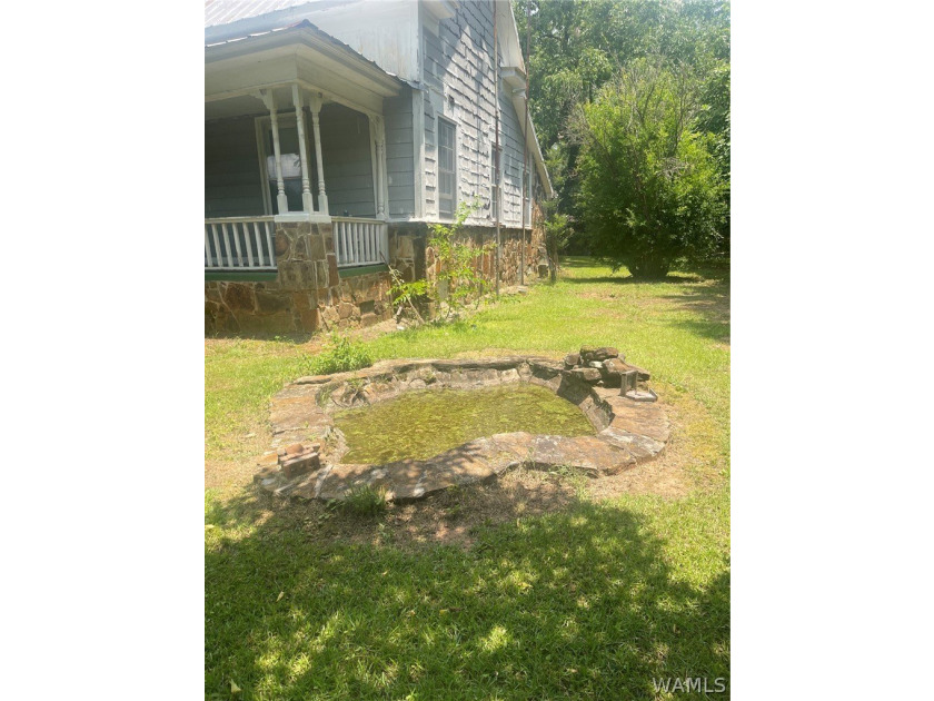 Discover this rare historical design home that needs TLC - photo 3