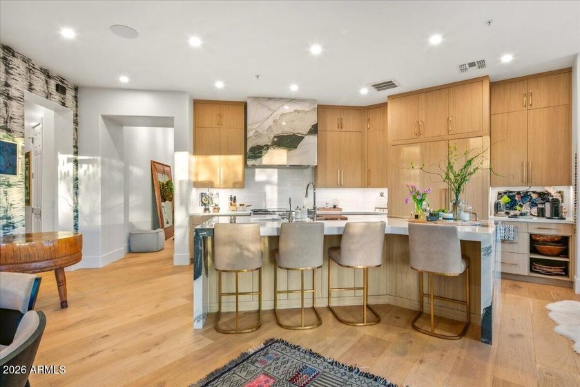 This stunning residence has been completely reimagined through - photo 11