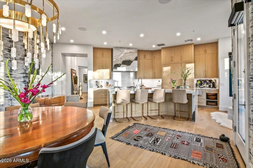 This stunning residence has been completely reimagined through - photo 14
