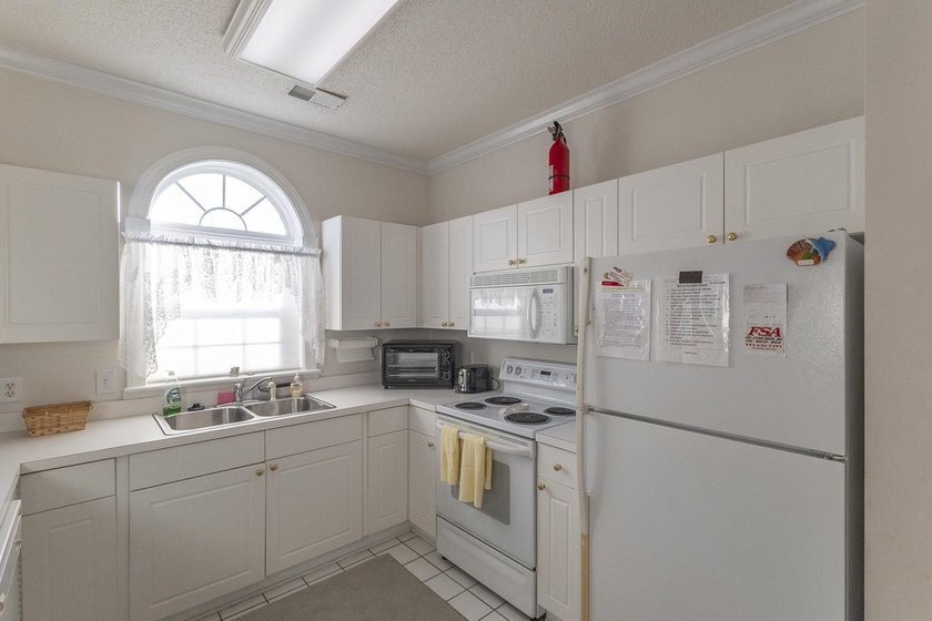 Experience comfort and convenience in this beautifully furnished - photo 11