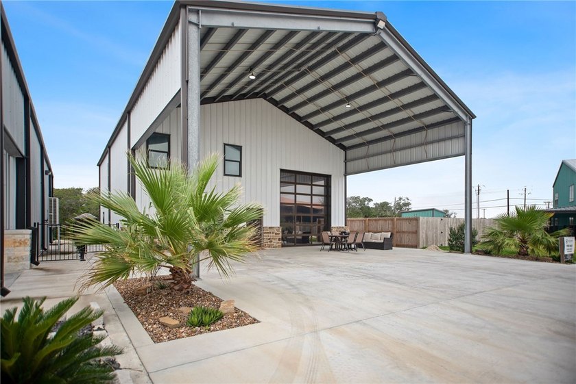 Custom-built barndominium blending charm with modern finishes - photo 2