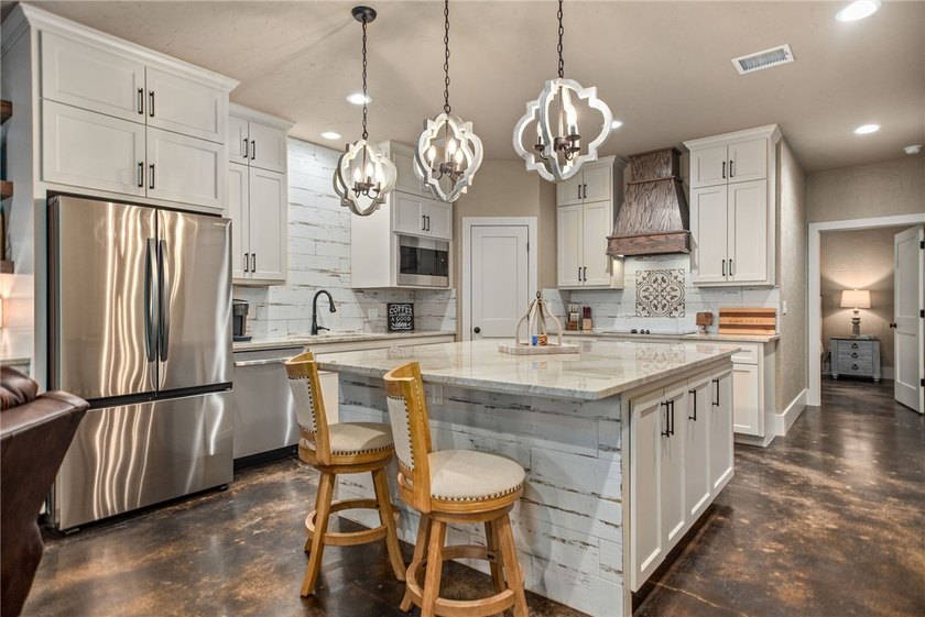 Custom-built barndominium blending charm with modern finishes - photo 6