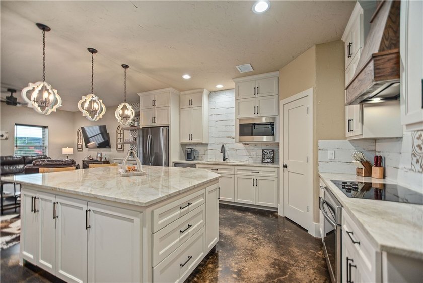 Custom-built barndominium blending charm with modern finishes - photo 8