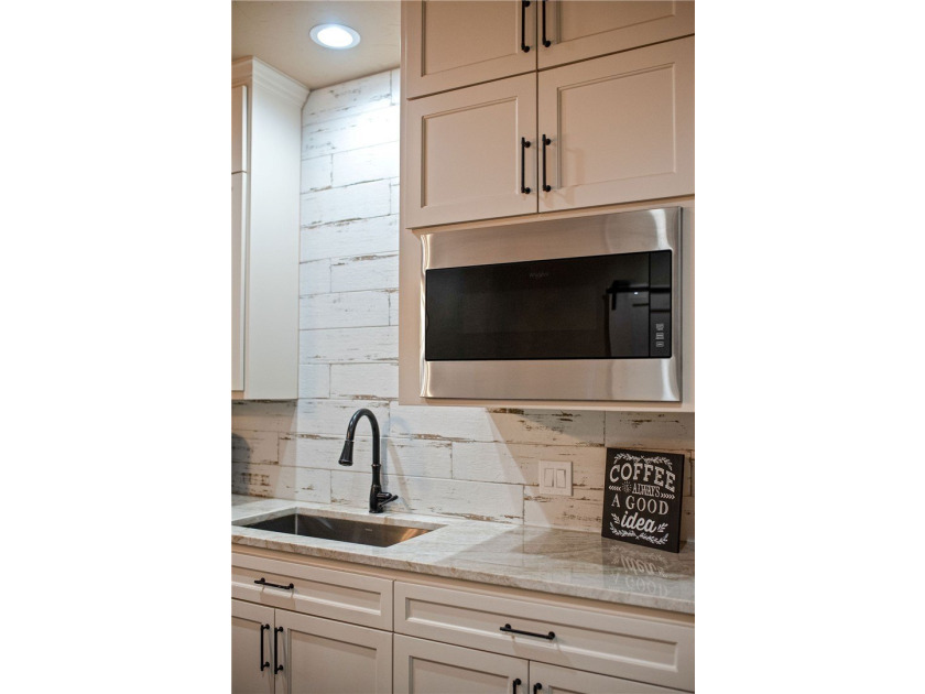 Custom-built barndominium blending charm with modern finishes - photo 10
