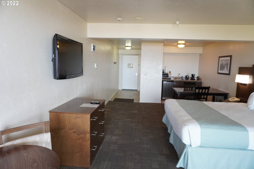 Oceanfront living at its best! A rare TOP floor unit ensures a - photo 13