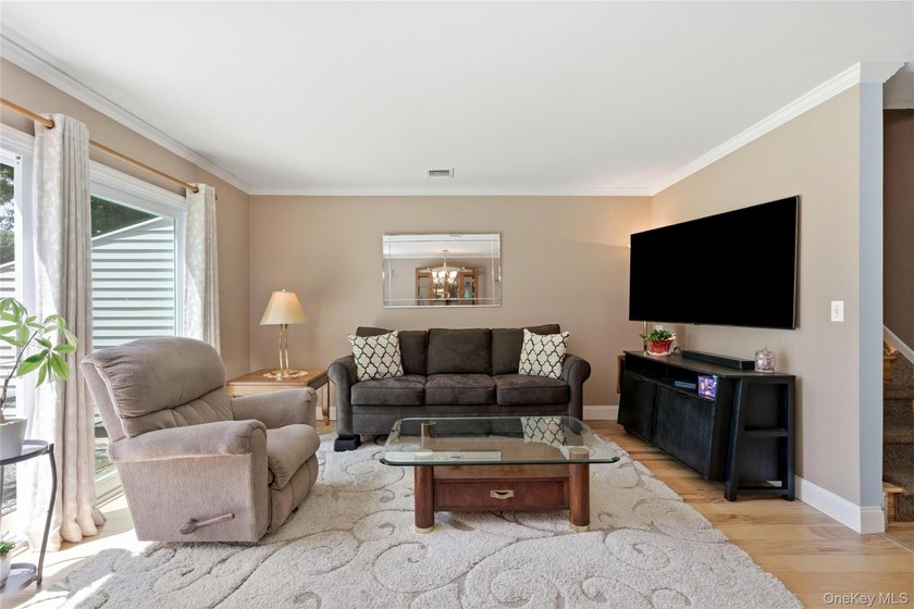 Welcome to The Meadows at Kings Park, a private, serene, and - photo 14