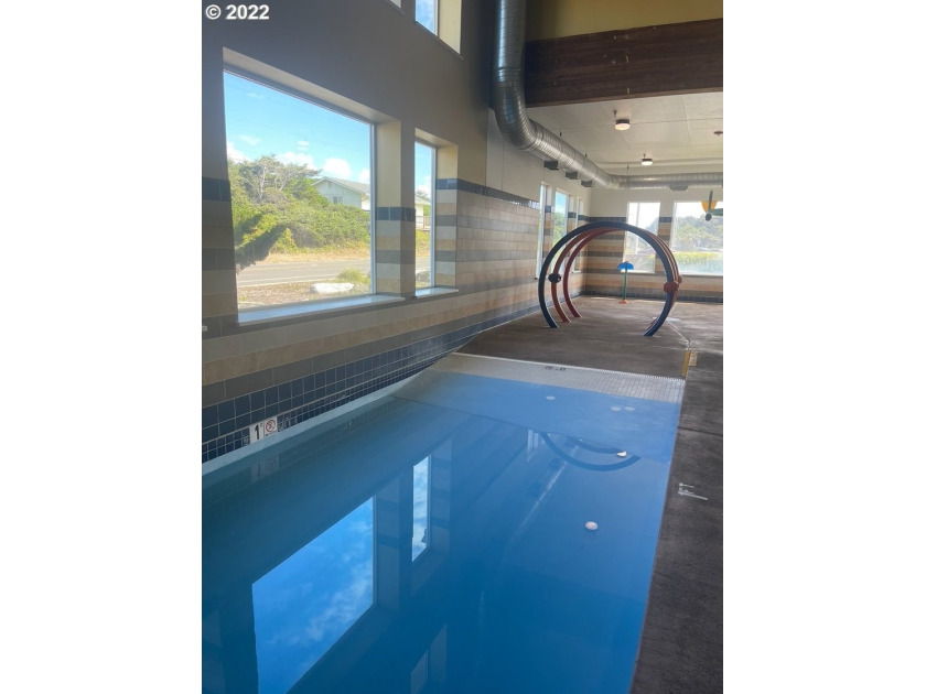 Oceanfront living at its best! A rare TOP floor unit ensures a - photo 16