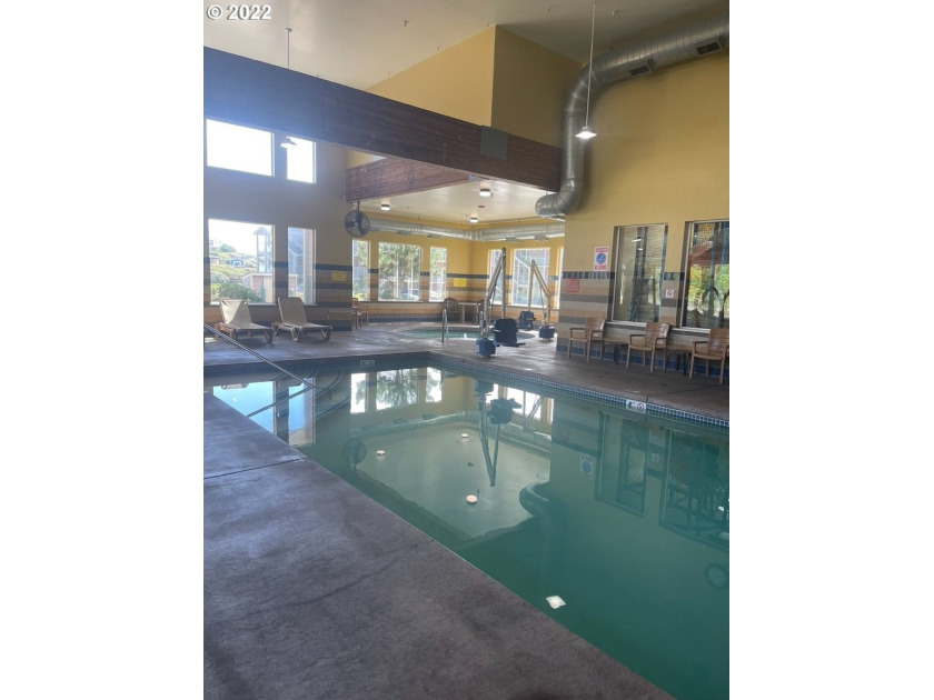 Oceanfront living at its best! A rare TOP floor unit ensures a - photo 17