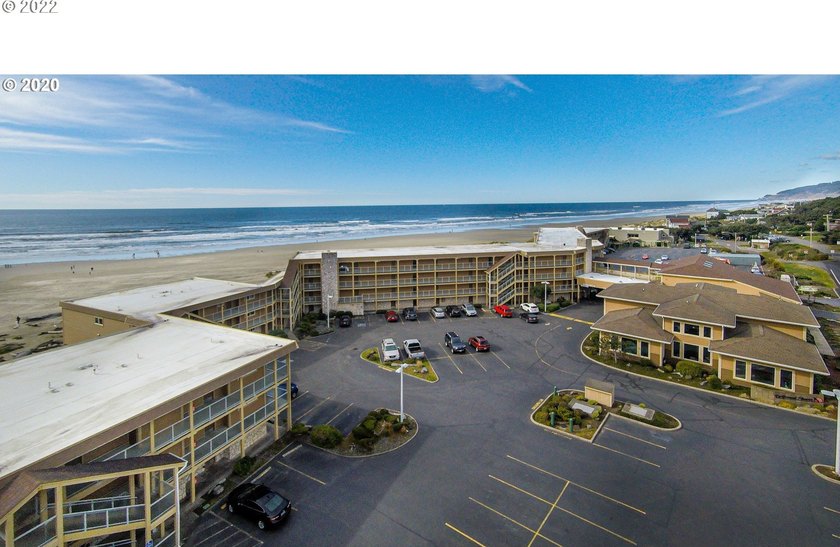 Oceanfront living at its best! A rare TOP floor unit ensures a - photo 22