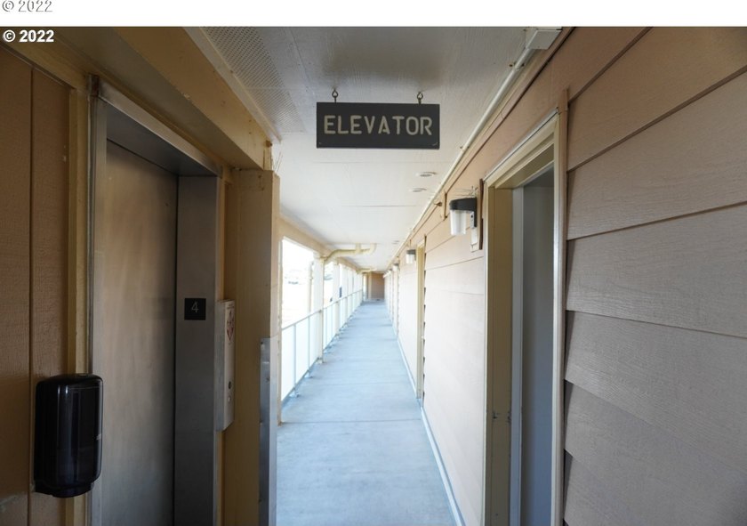 Oceanfront living at its best! A rare TOP floor unit ensures a - photo 23