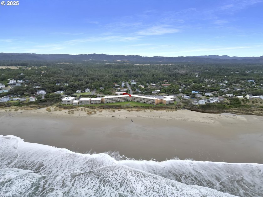 Oceanfront living at its best! A rare TOP floor unit ensures a - photo 24
