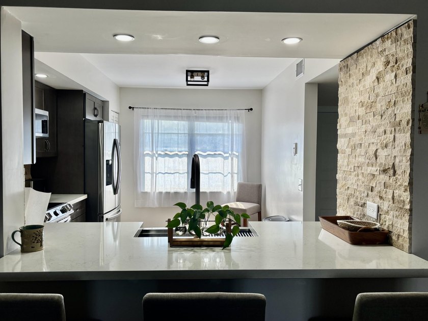 Discover this beautifully renovated 2-bedroom, 2-bathroom condo - photo 29