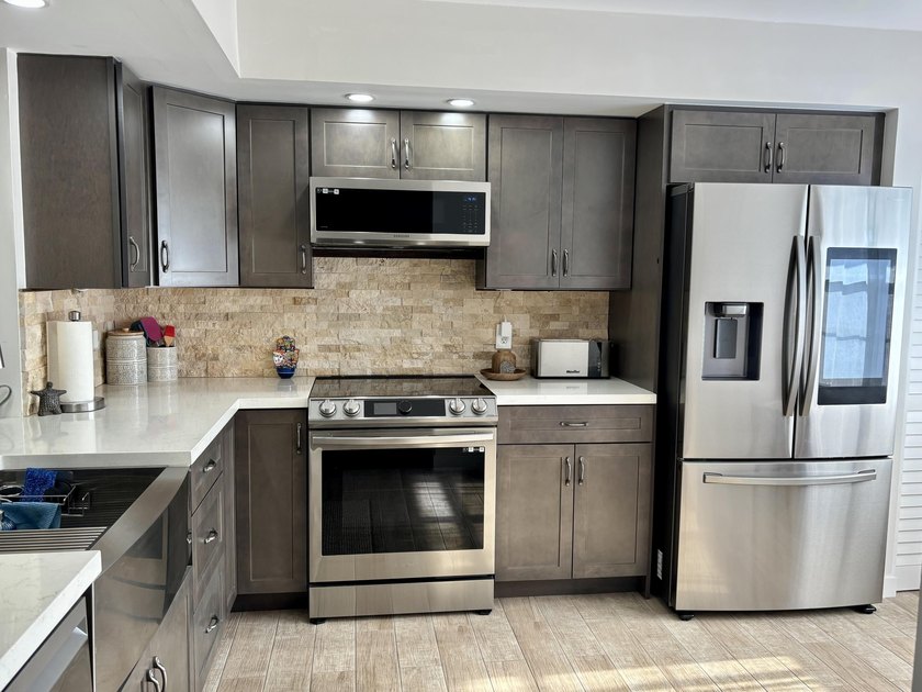 Discover this beautifully renovated 2-bedroom, 2-bathroom condo - photo 34