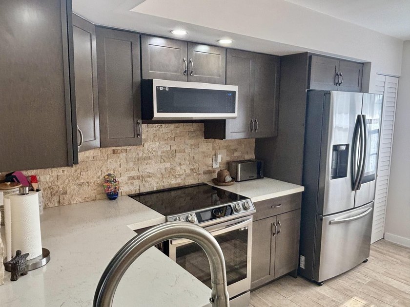 Discover this beautifully renovated 2-bedroom, 2-bathroom condo - photo 40