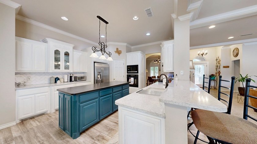 Unbeatable location! This open-concept home features recent - photo 8