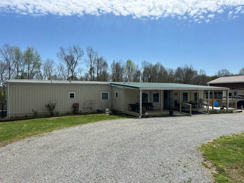 MOBILE HOME W/ ADDITION-STORAGE BLDGS. - NEAR HOLMES BEND MARINA - photo 4