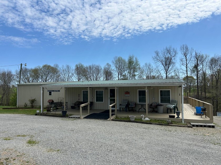 MOBILE HOME W/ ADDITION-STORAGE BLDGS. - NEAR HOLMES BEND MARINA - photo 5