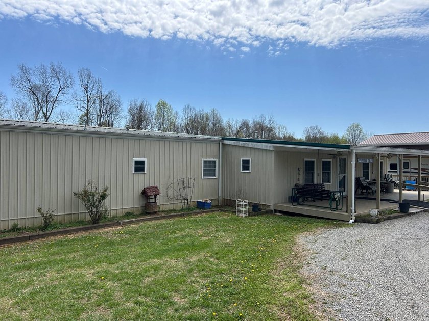 MOBILE HOME W/ ADDITION-STORAGE BLDGS. - NEAR HOLMES BEND MARINA - photo 7