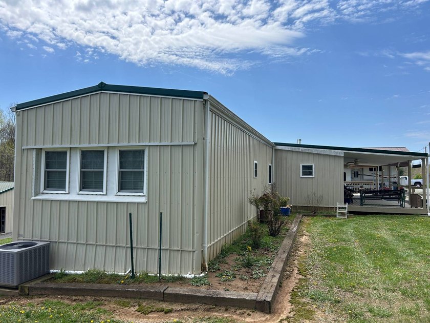 MOBILE HOME W/ ADDITION-STORAGE BLDGS. - NEAR HOLMES BEND MARINA - photo 8