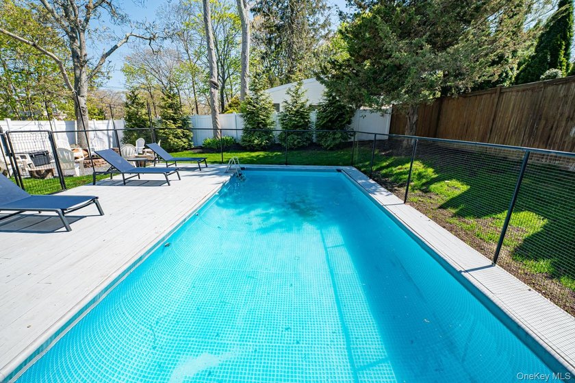 Ideally situated in the heart of Hampton Bays with walk-to- town - photo 11
