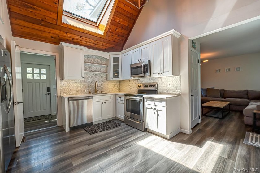 Ideally situated in the heart of Hampton Bays with walk-to- town - photo 23