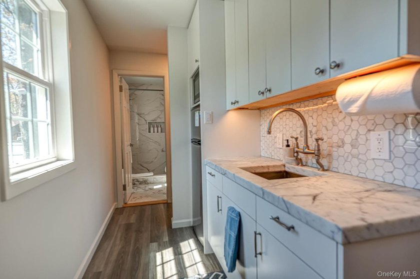 Ideally situated in the heart of Hampton Bays with walk-to- town - photo 33