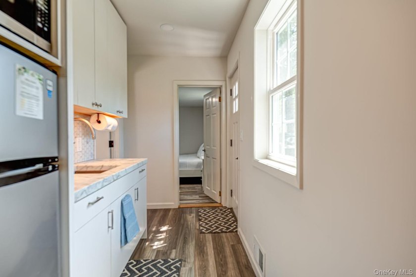 Ideally situated in the heart of Hampton Bays with walk-to- town - photo 35