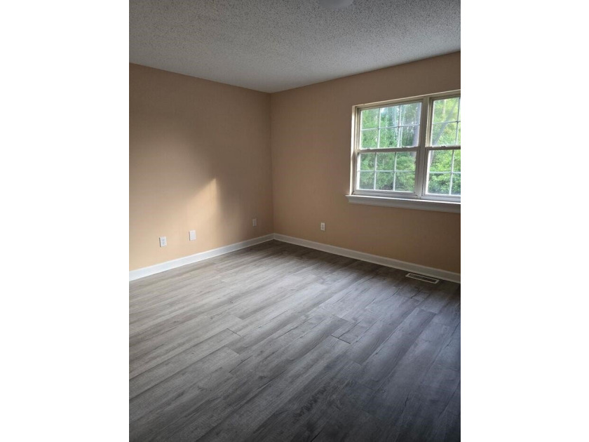 Beautifully maintained 3-bedroom, 2-bath corner-unit townhome in - photo 34