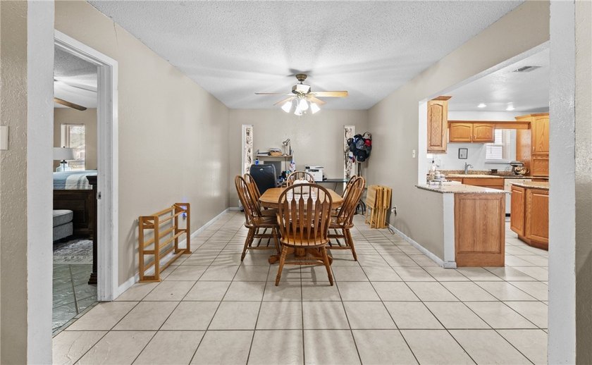 This 3-bed, 2-bath brick home sits on a large corner lot in an - photo 6