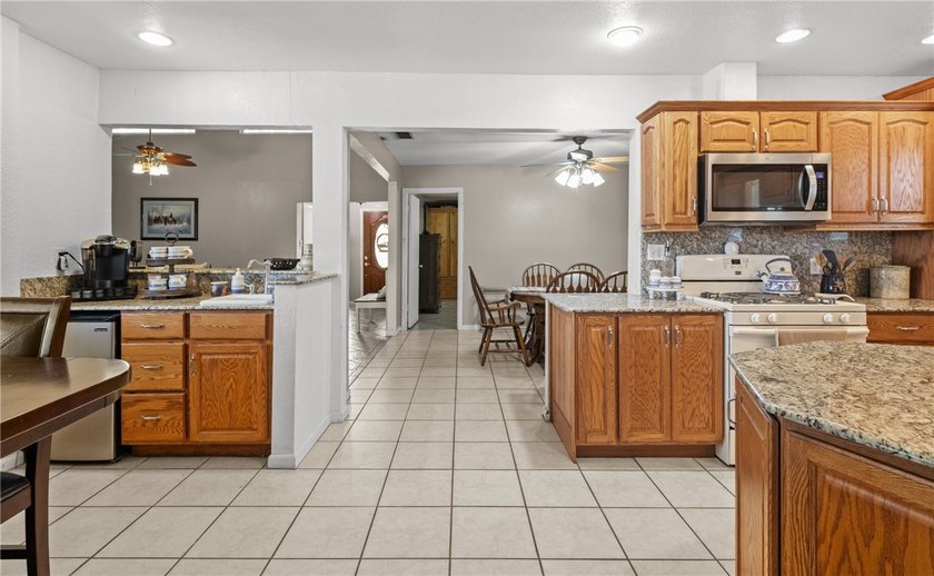 This 3-bed, 2-bath brick home sits on a large corner lot in an - photo 9