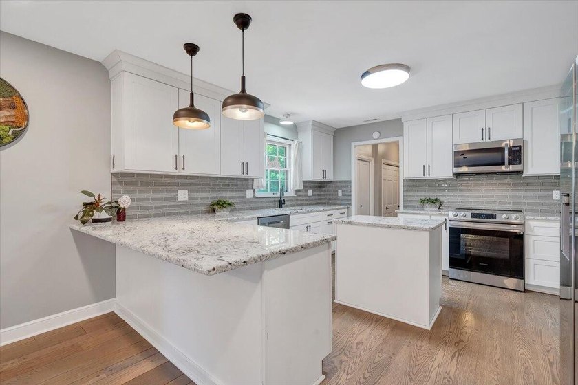 Welcome to this beautifully updated ranch home located in the - photo 24