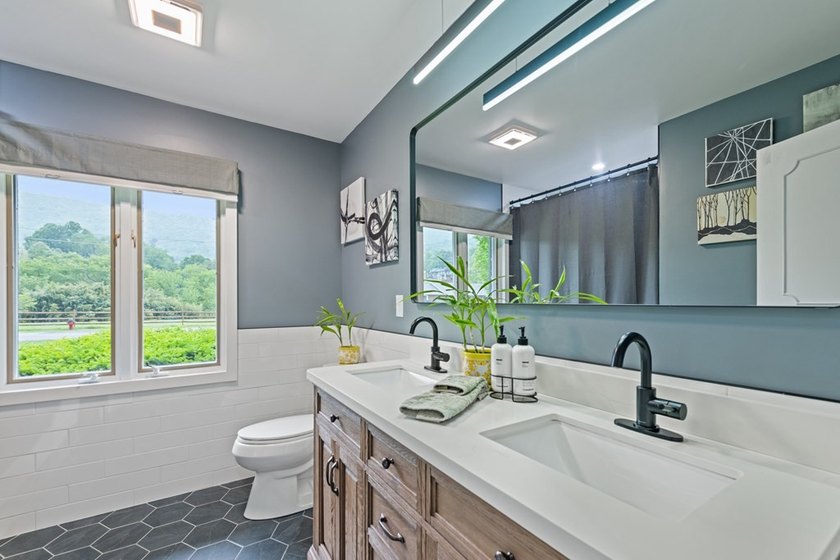 Experience elevated mountain living with the rare combination of - photo 24