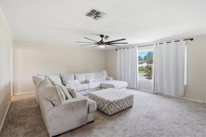 Welcome to this well-maintained 3-bedroom, 1.5-bath home in - photo 2