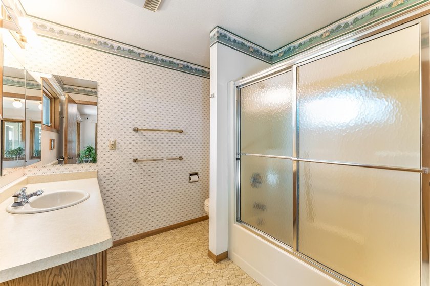 Welcome to this spacious Northwoods waterfront retreat on - photo 32