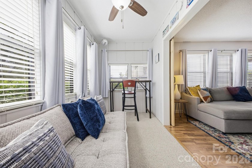 This highly coveted lower-level end unit in the Cloisters - photo 11