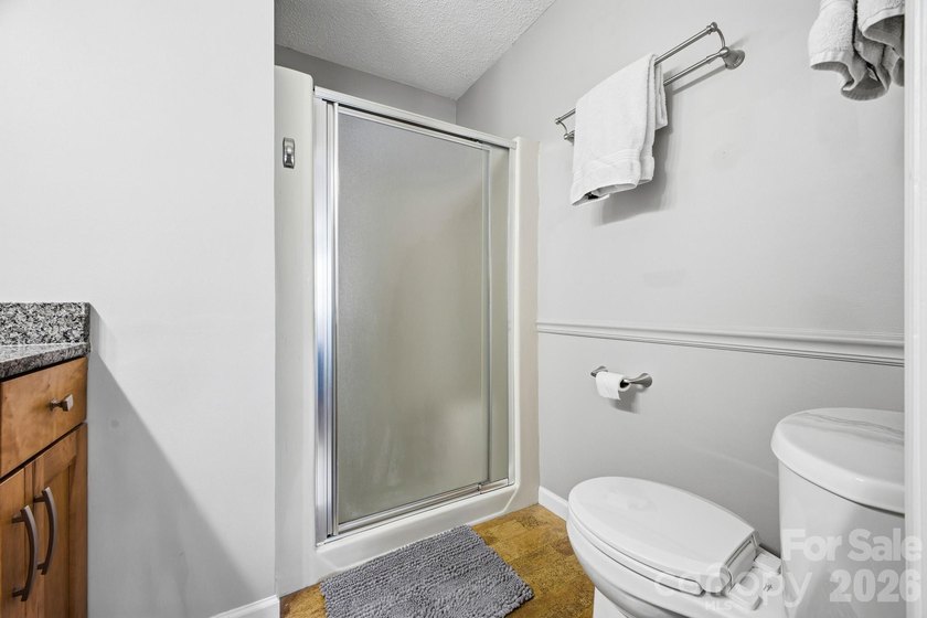 This highly coveted lower-level end unit in the Cloisters - photo 14