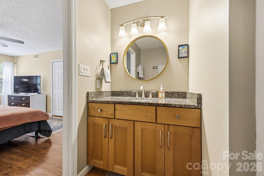 This highly coveted lower-level end unit in the Cloisters - photo 17