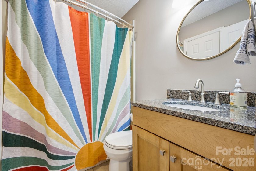 This highly coveted lower-level end unit in the Cloisters - photo 18