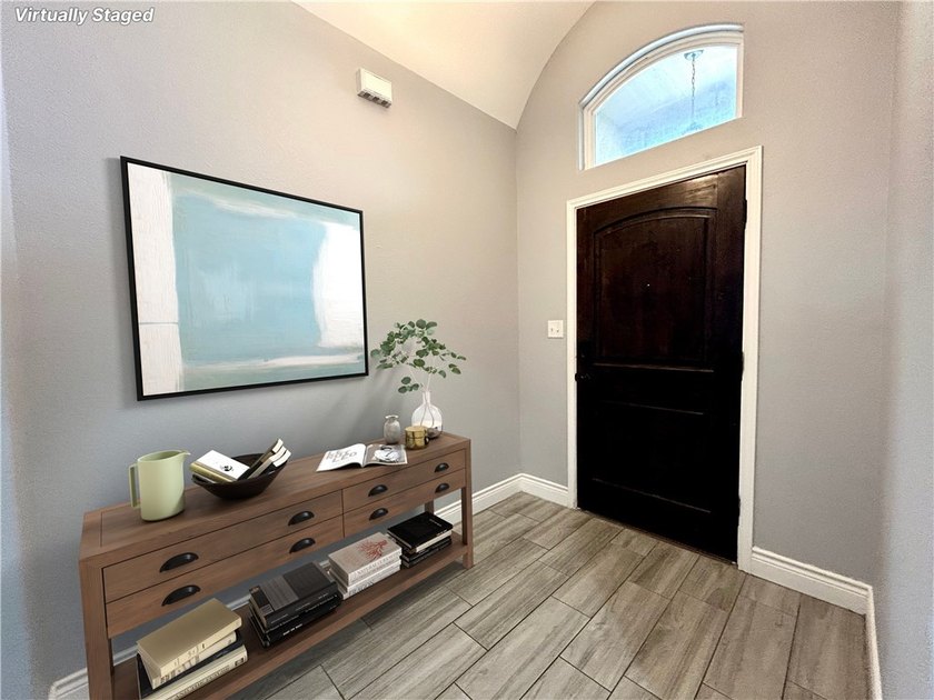 Nestled back in a private, gated community, this well taken care - photo 3