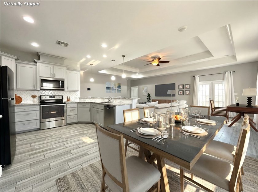 Nestled back in a private, gated community, this well taken care - photo 9
