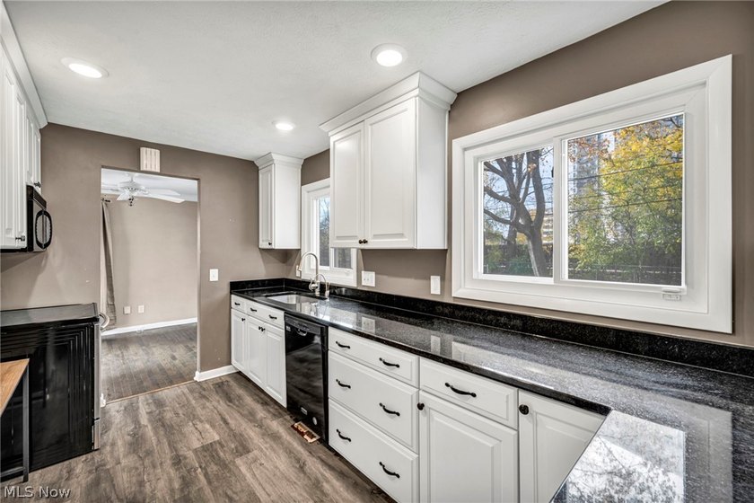 Welcome to 180 E. 264th Street, a beautifully updated 3-bedroom - photo 11