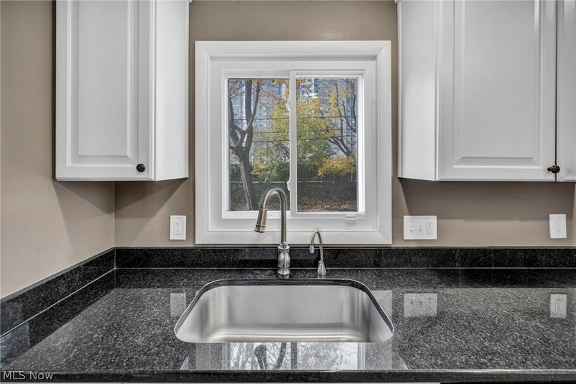 Welcome to 180 E. 264th Street, a beautifully updated 3-bedroom - photo 12